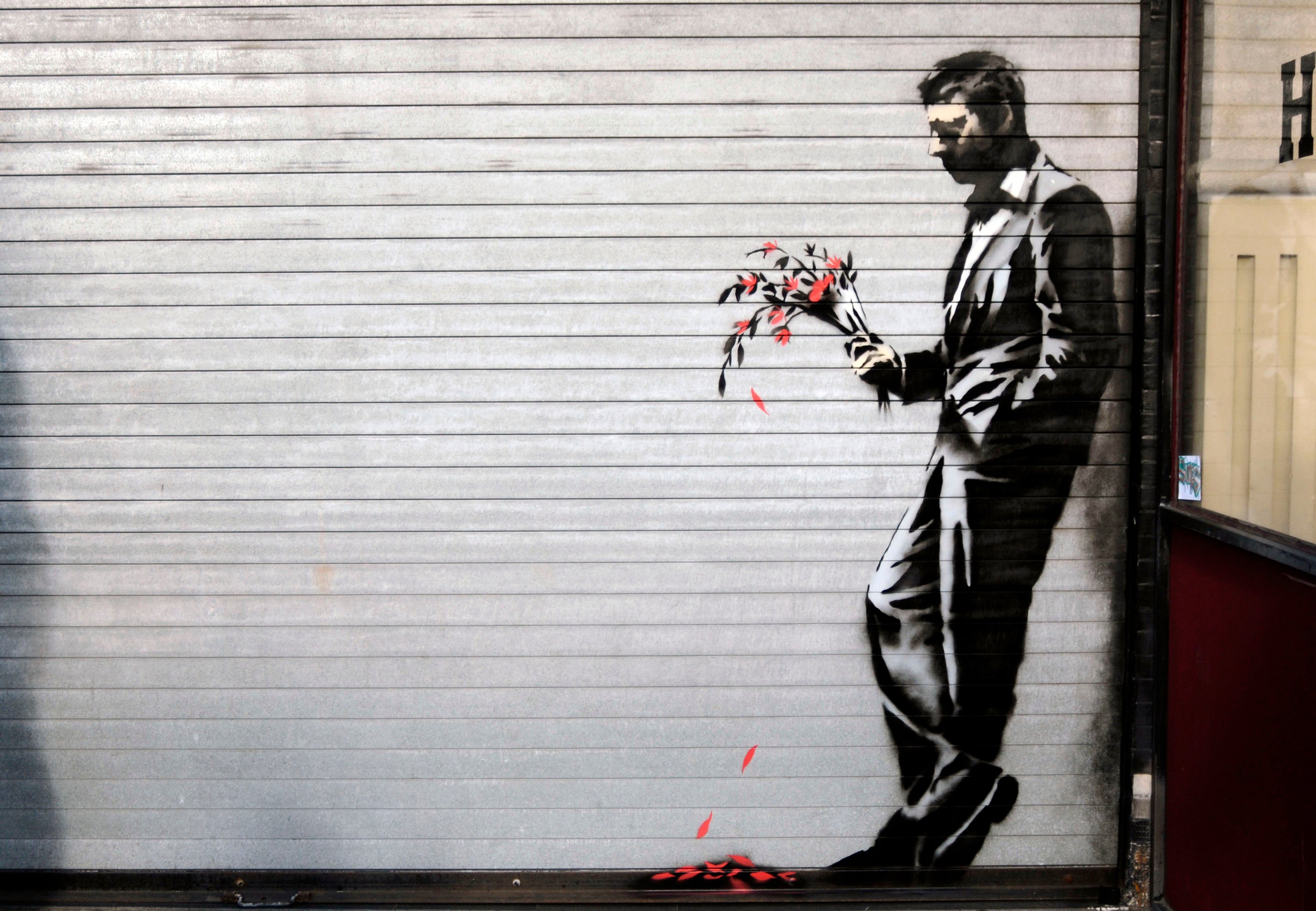 Banksy Man With Flowers - Canvas Wall Art Print - Various Sizes